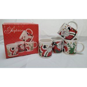 At Home Santa Surprise Set of 4 Christmas Mugs Style #2115